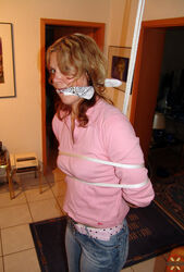 ladies ball-gagged and corded. Photo #1